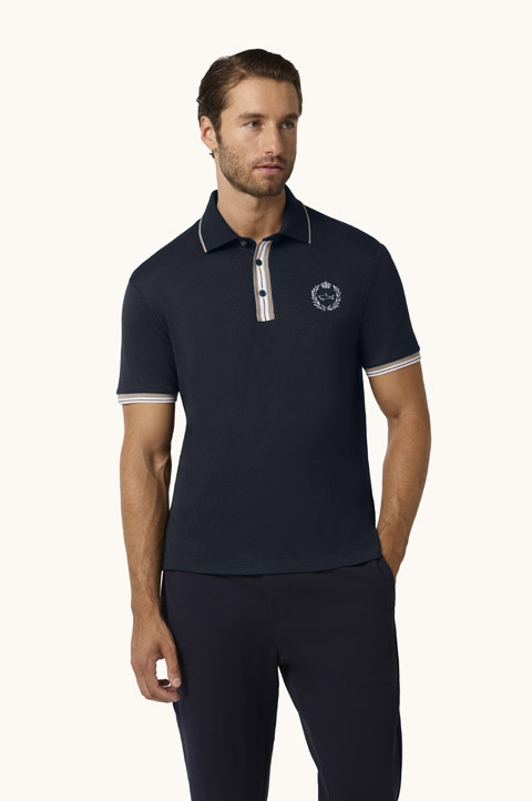 Polo X-Soft de algod&oacute;n interlock con bordado her&aacute;ldico y detalles de rayas