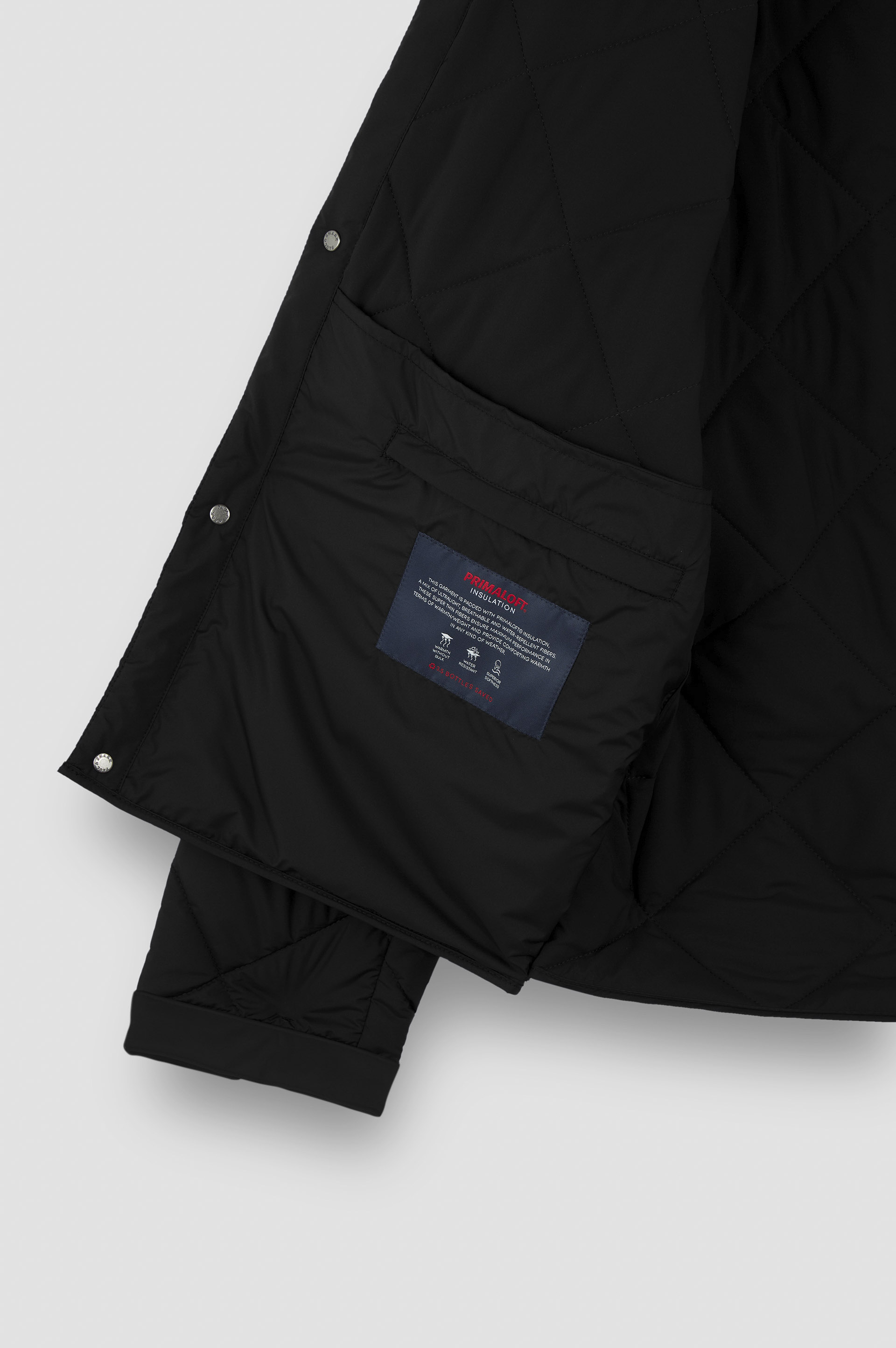 Chaqueta acolchada en tejido técnico con detalles en Alcantara® image number 7