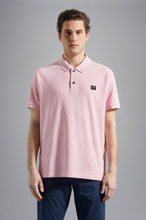 Polo en coton piqu&eacute; avec badge iconique